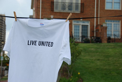 Live United T-Shirt hanging on Clothesline